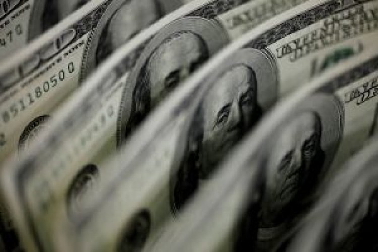 Dollar reserves drop to $103B